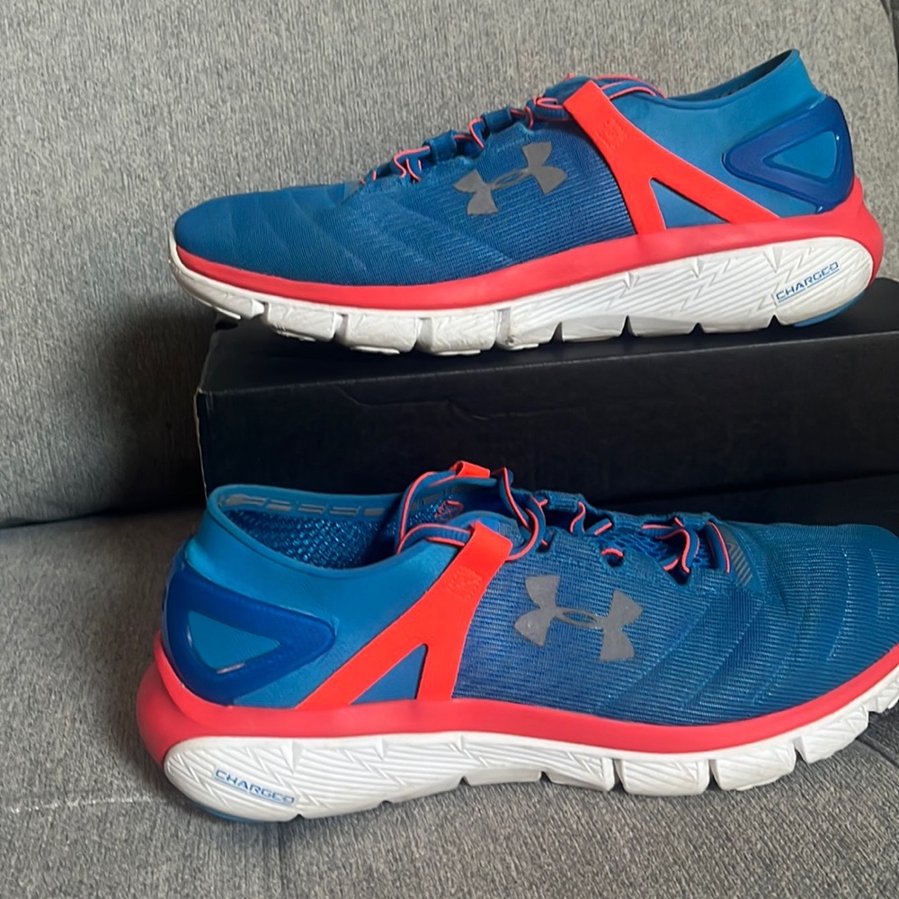 Under armor, charged orange and blue color way
